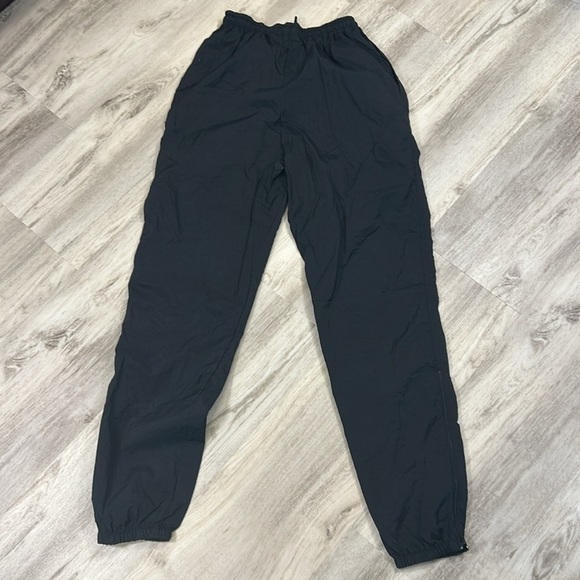 Vintage Nike Black Embroidered Logo Zippered Leg Nylon Windbreaker Track Pants S - Picture 4 of 8